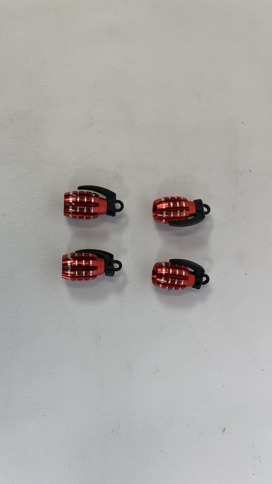 Grenade valve caps red